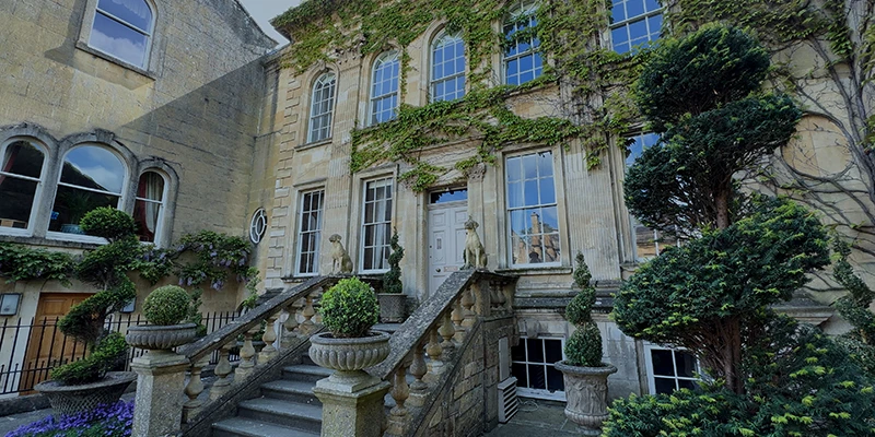 Bedfont House Georgian mansion with two stone watchdogs flanking the entrance
