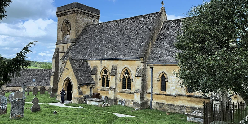 Full-length view of the church from the side path