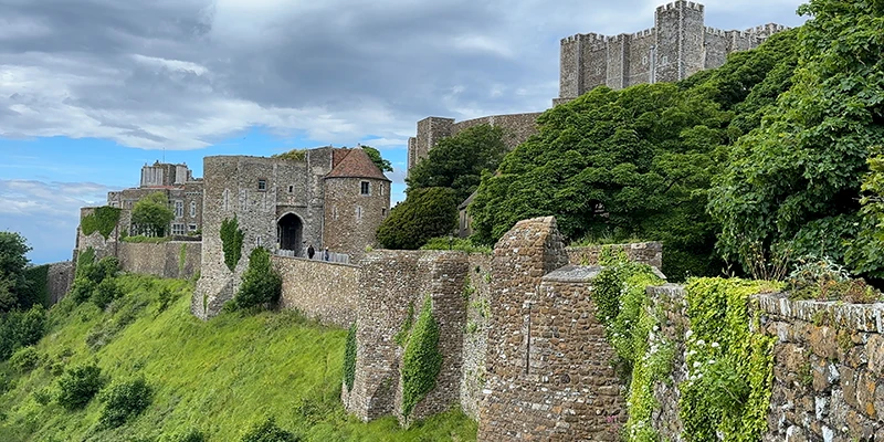 Dover Castle walls on the green hillside above the town