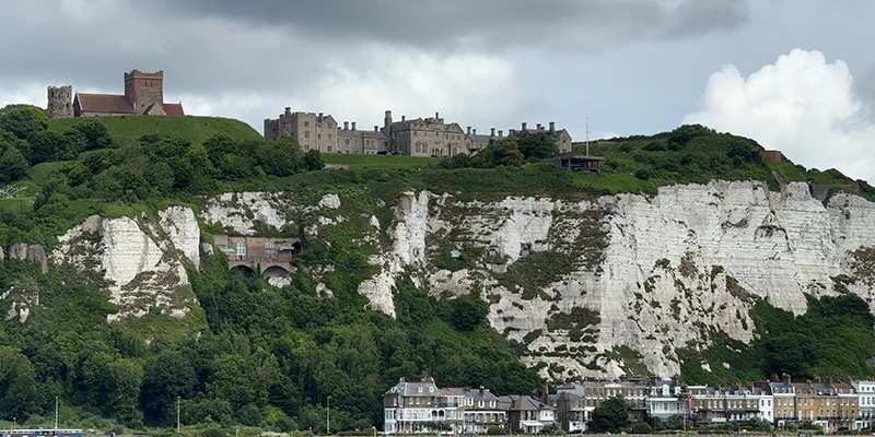 Dover Castle on the cliff top seen from the sea