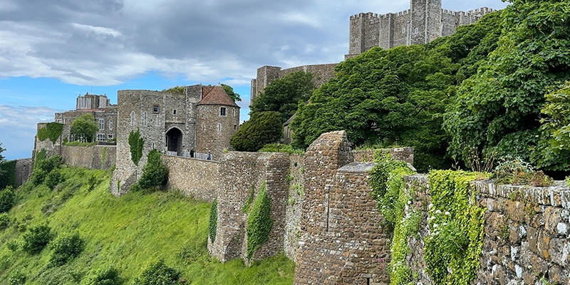 Dover Castle walls running along the green hillside