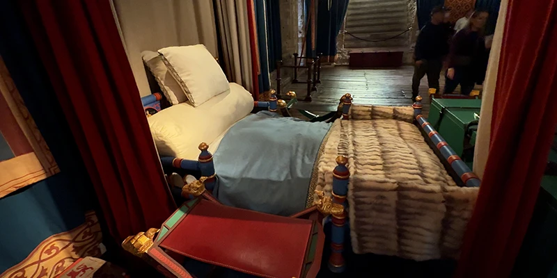 The King's bedchamber at Dover Castle with its red canopied bed