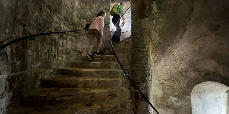 Visitors on the spiral staircase inside the Great Tower at Dover Castle