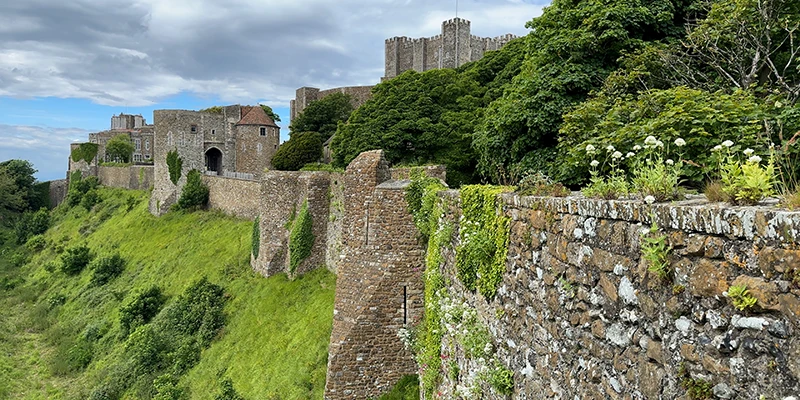 The outer wall of Dover Castle on the green slope