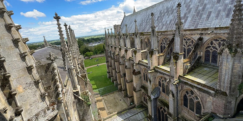 The roof and buttresses of Ely Cathedral seen from the tower walkway