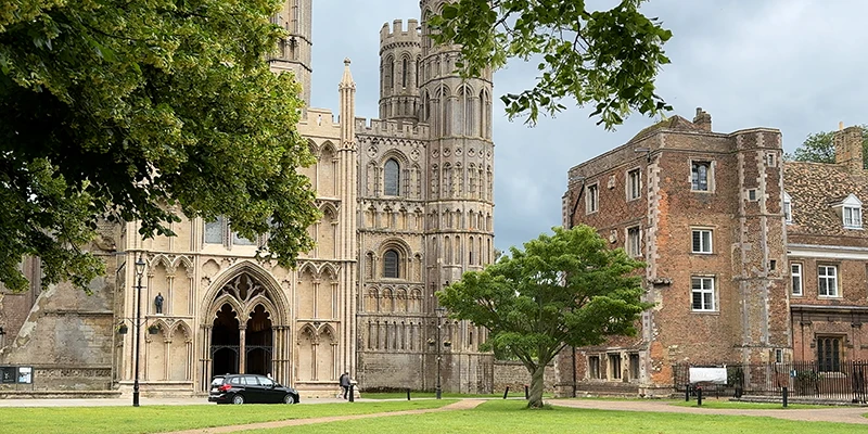 The west front of Ely Cathedral and the former bishop's palace