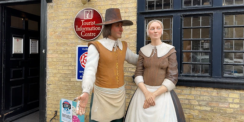 Cutout figures in period dress outside Oliver Cromwell's House