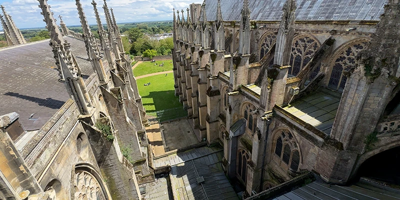 Stonework and pinnacles of Ely Cathedral seen from the roof walkway