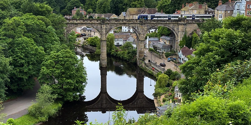 The Knaresborough viaduct crossing the River Nidd, seen from the castle viewpoint above