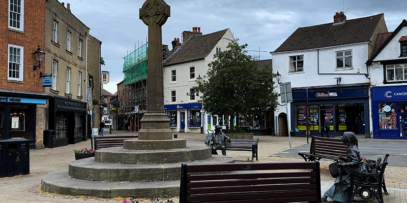 The Market Place at Knaresborough with the market cross and benches