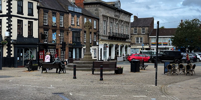 Buildings and parked cars around the market square in Knaresborough