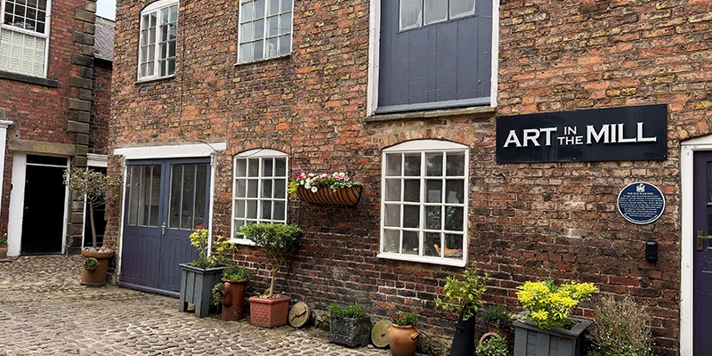The old mill building housing an art gallery in Green Dragon Yard