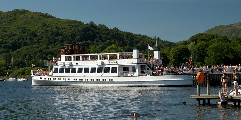 A Windermere cruise boat arriving at the pier at Waterhead near Ambleside