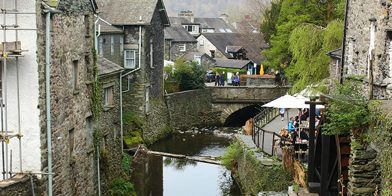 Bridge House in Ambleside, a tiny stone building straddling Stock Beck