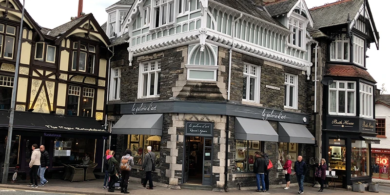 Half-timbered shops in Bowness at the end of the day