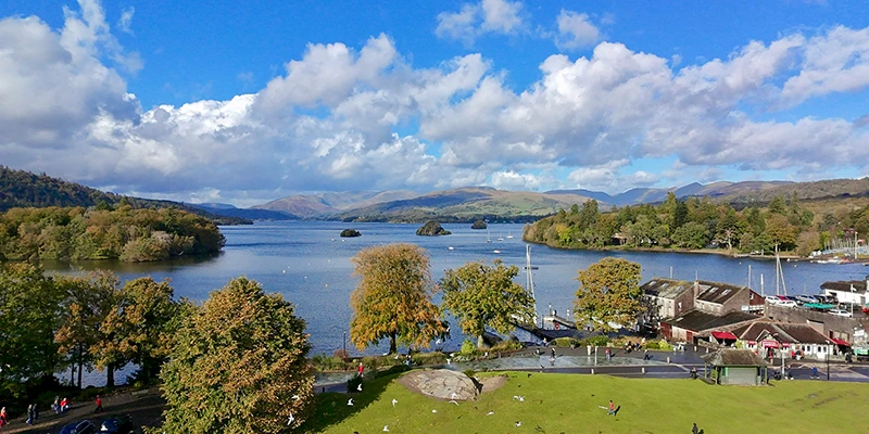 A lakeside bar and grill with outdoor seating in Bowness
