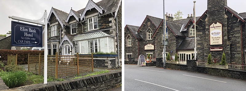 Larger guesthouses with hanging signs on a road in Windermere