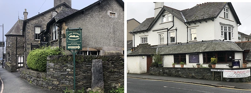 Stone wall and hedge in front of a slate-roofed house on the edge of Windermere
