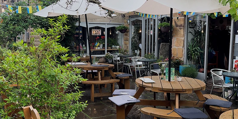 Outdoor tables in a pub beer garden in Bakewell