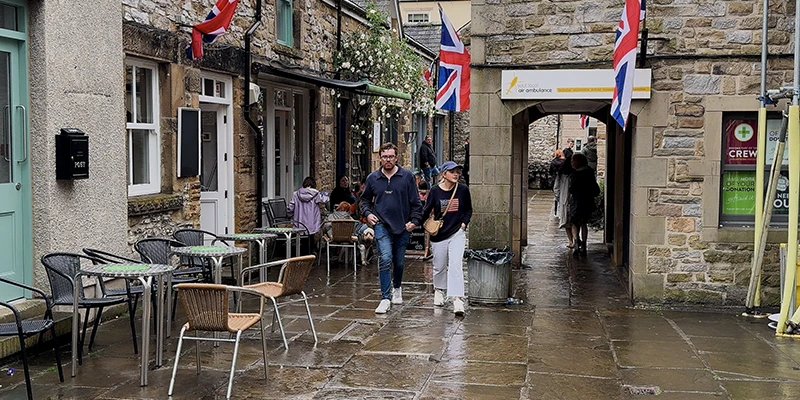 A cafe with outdoor seating in a Bakewell alley