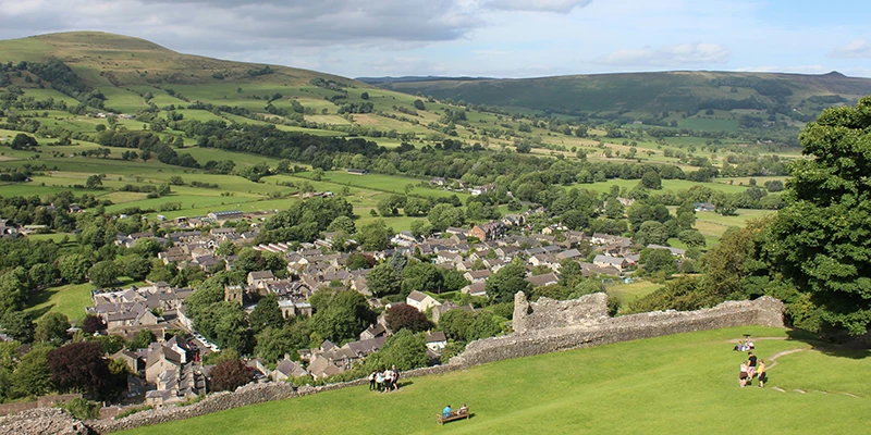 Castleton set in the green Hope Valley seen from Peveril Castle