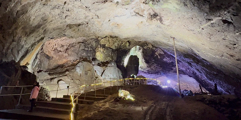 A vast underground cavern lit for visitors near Castleton