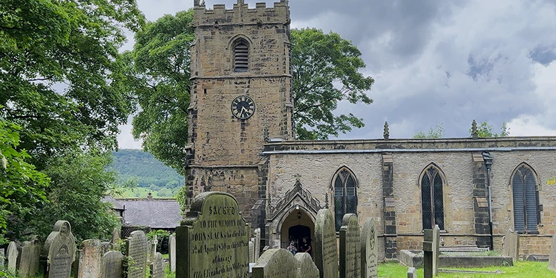 The parish church of St. Edmund and its churchyard in Castleton