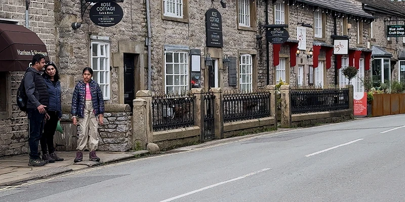 A traditional stone street with pubs and cottages in Castleton