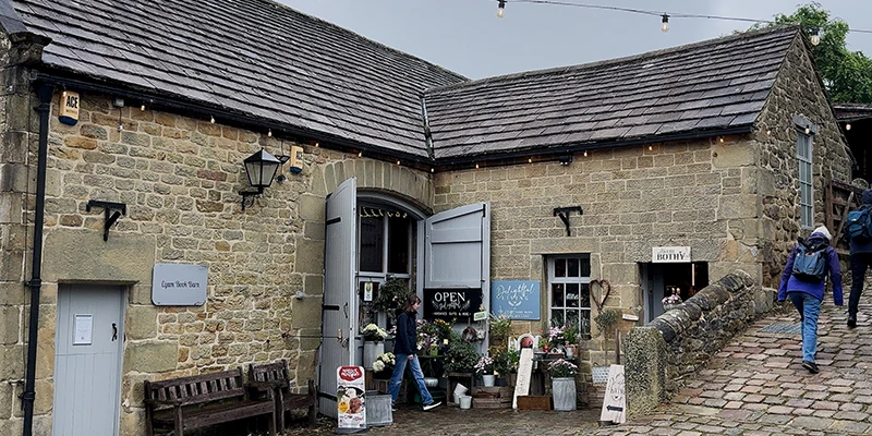 Visitors outside a shop in Eyam