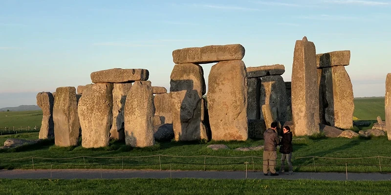 The circle at Stonehenge glowing in the last light of day