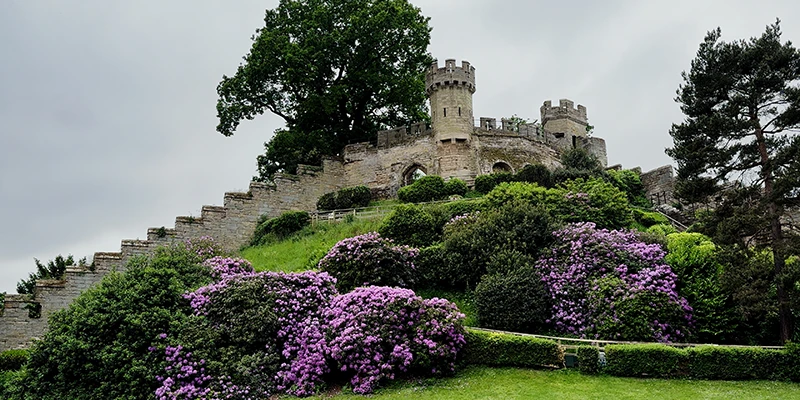 The Capability Brown landscaped grounds below the walls of Warwick Castle