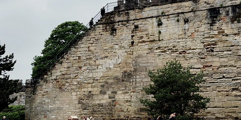 Stone staircase leading up to the rampart walkway on the Warwick Castle curtain wall