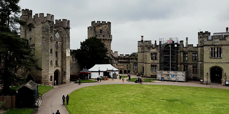 The medieval curtain wall and towers of Warwick Castle built in the 1300s
