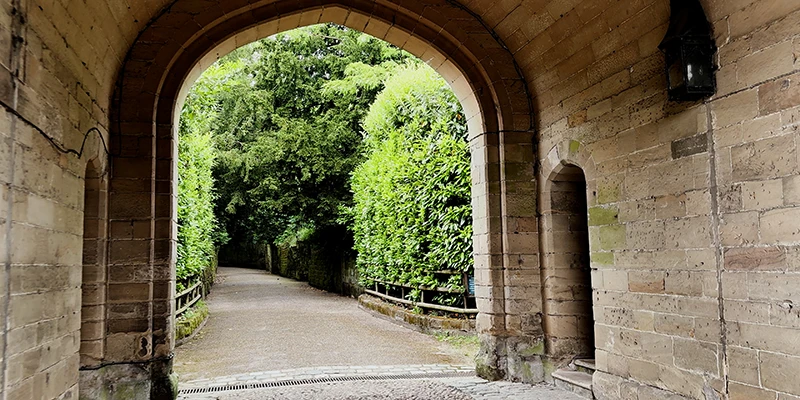 Lane cut through the sandstone leading back up into the old town of Warwick