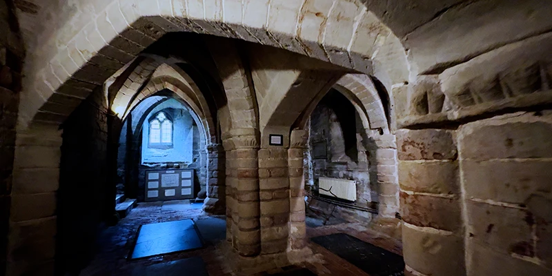 The Norman crypt beneath St Mary's Church in Warwick, low vaults on heavy round piers