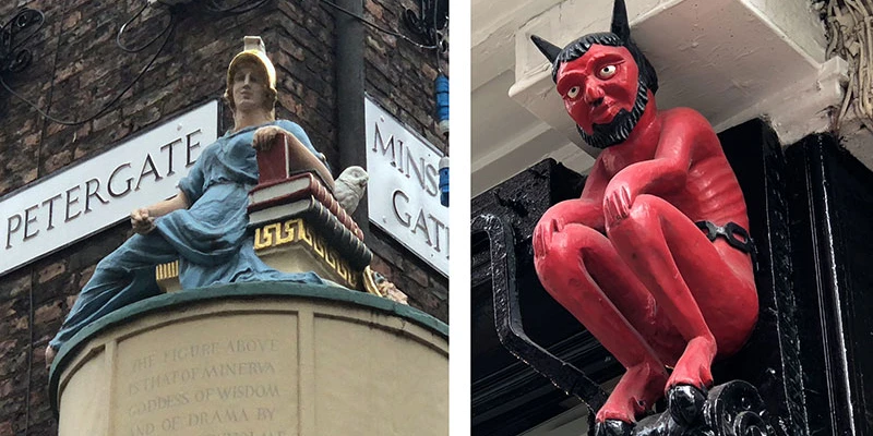 Minerva and Red Devil statues