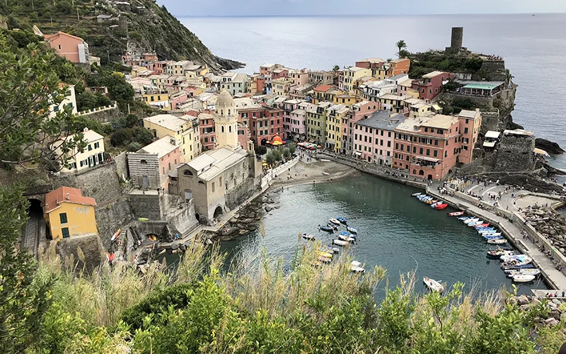 The village of Vernazza in the Cinque Terre above its harbor