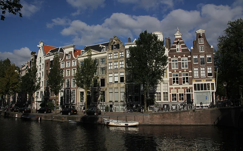 Row of canal houses in Amsterdam with stepped gables
