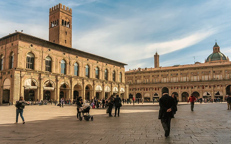 Piazza Maggiore in Bologna with its arcaded buildings and tower
