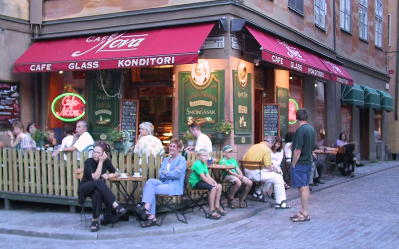 Outdoor cafe tables in a square in the old town of Stockholm