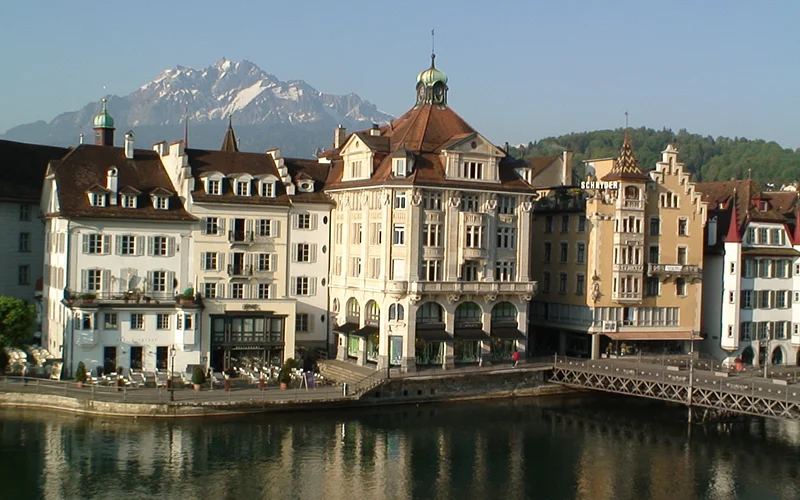 Waterfront buildings in Lucerne reflected in the lake