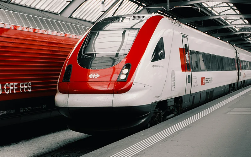 Swiss and other high-speed trains side by side in a station