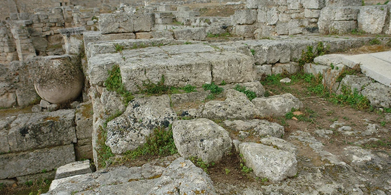 Excavated terraces and fallen blocks at Corinth