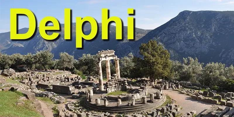 Delphi cov Tholos 10 - drama of setting at Mount Parnassos