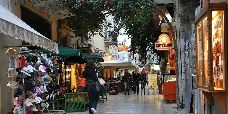 Colorful shopfronts along a Nafplion street