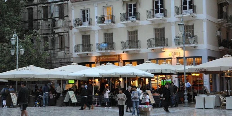 Diners at an outdoor taverna in Nafplion