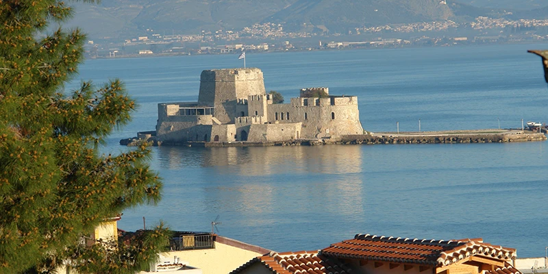 The Bourtzi seen across the water at dusk