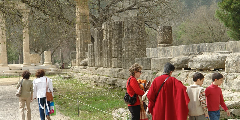 Visitors among the ruins of the Olympia sanctuary