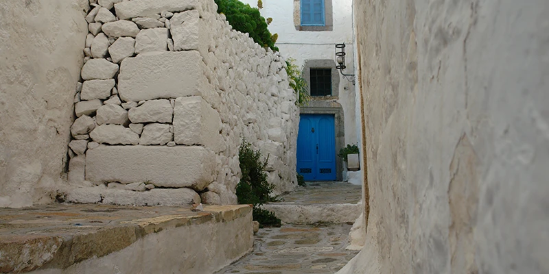 Whitewashed walls and a blue door in the old village