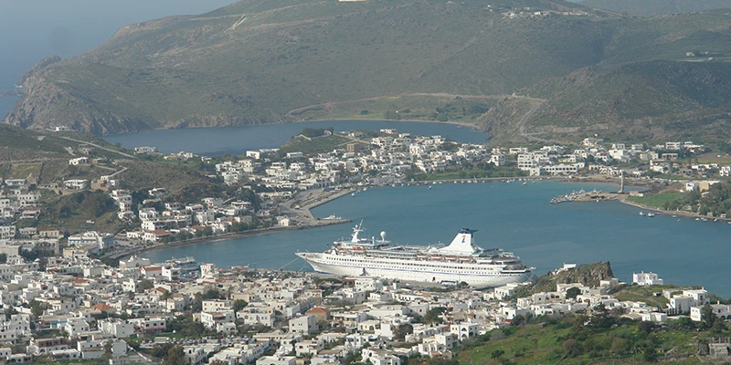 Aerial view over Patmos harbor and a cruise ship